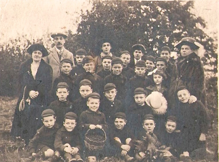 Matron Emily White (left) and the Irish boys in England, 1922 - about to leave England for Australia  (Courtesy Margaret Widders)